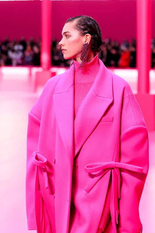 Model with a pink Valentino coat